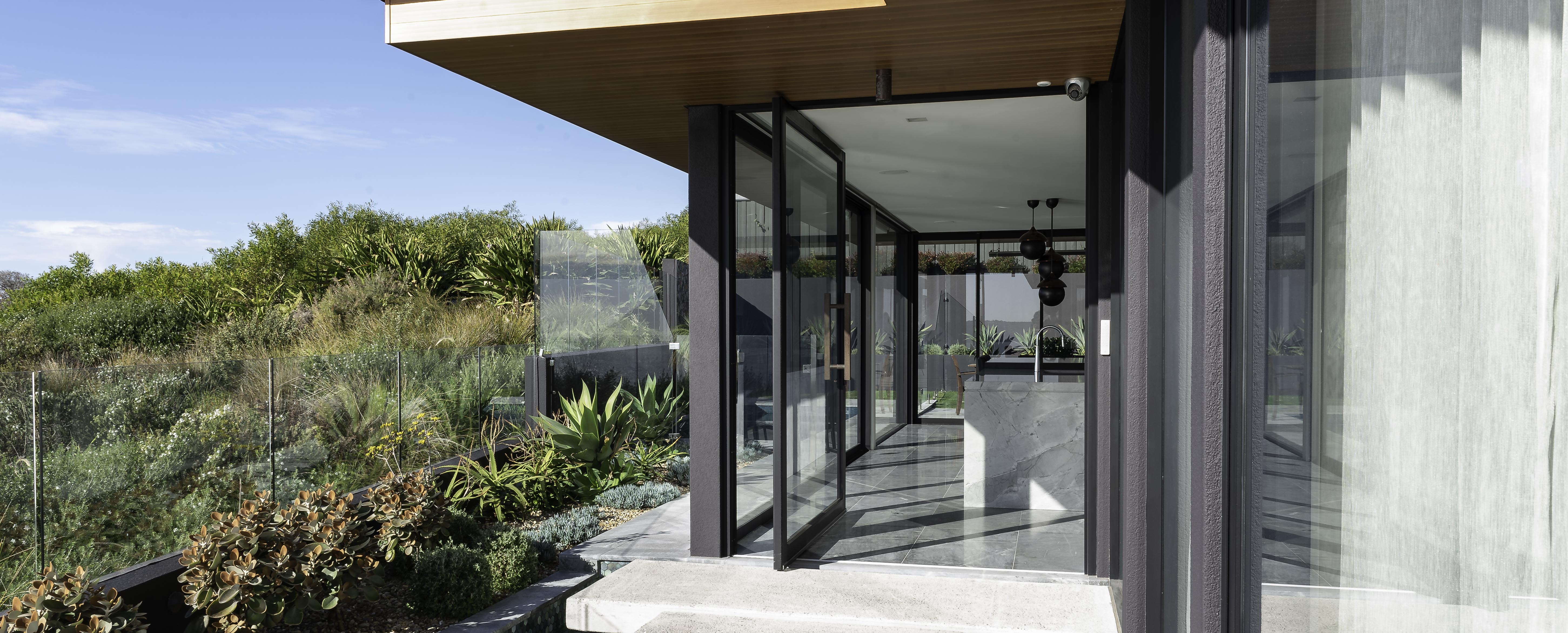 Aluminium pivot doors | Elevate Aluminium Products | AWS 